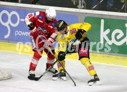 EBEL. Eishockey Bundesliga. KAC gegen	spusu Vienna Capitals. Thomas Koch,  (KAC),  Armin Preiser (Vienna Capitals). Klagenfurt, am 11.3.2022.
Foto: Kuess
www.qspictures.net

---
pressefotos, pressefotografie, kuess, qs, qspictures, sport, bild, bilder, bilddatenbank