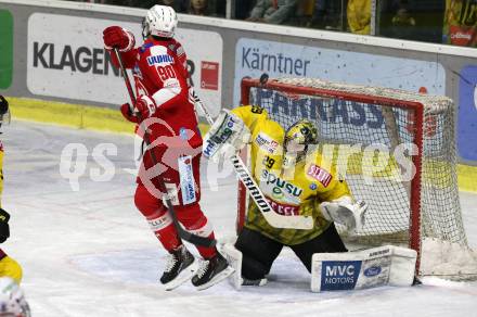 EBEL. Eishockey Bundesliga. KAC gegen	spusu Vienna Capitals. Matthew Fraser,   (KAC),  Bernhard Starkbaum (Vienna Capitals). Klagenfurt, am 11.3.2022.
Foto: Kuess
www.qspictures.net

---
pressefotos, pressefotografie, kuess, qs, qspictures, sport, bild, bilder, bilddatenbank