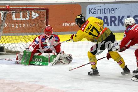 EBEL. Eishockey Bundesliga. KAC gegen	spusu Vienna Capitals. Sebastian Dahm, (KAC), Joel Lowry   (Vienna Capitals). Klagenfurt, am 11.3.2022.
Foto: Kuess
www.qspictures.net

---
pressefotos, pressefotografie, kuess, qs, qspictures, sport, bild, bilder, bilddatenbank