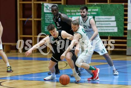 Basketball 2. Liga 2021/2022. Grunddurchgang 19. Runde.  KOS Celovec gegen  RAIDERS Tirol. Tim Huber  (KOS),  Ziga Habat  (Tirol). Klagenfurt, am 12.3.2022.
Foto: Kuess
www.qspictures.net
---
pressefotos, pressefotografie, kuess, qs, qspictures, sport, bild, bilder, bilddatenbank