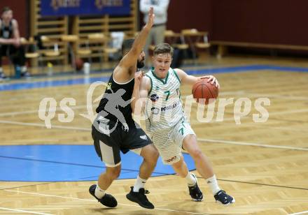 Basketball 2. Liga 2021/2022. Grunddurchgang 19. Runde.  KOS Celovec gegen  RAIDERS Tirol.  Valentin Pasterk (KOS), Lisandro Pascasio  (Tirol). Klagenfurt, am 12.3.2022.
Foto: Kuess
www.qspictures.net
---
pressefotos, pressefotografie, kuess, qs, qspictures, sport, bild, bilder, bilddatenbank