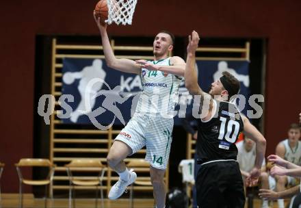 Basketball 2. Liga 2021/2022. Grunddurchgang 19. Runde.  KOS Celovec gegen  RAIDERS Tirol.  Marko Gutalj (KOS), Timur Bas  (Tirol). Klagenfurt, am 12.3.2022.
Foto: Kuess
www.qspictures.net
---
pressefotos, pressefotografie, kuess, qs, qspictures, sport, bild, bilder, bilddatenbank