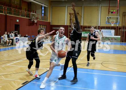 Basketball 2. Liga 2021/2022. Grunddurchgang 19. Runde.  KOS Celovec gegen  RAIDERS Tirol. Marko Gutalj  (KOS), Tim-Joel Deschner , John Franklyn Gardiner   (Tirol). Klagenfurt, am 12.3.2022.
Foto: Kuess
www.qspictures.net
---
pressefotos, pressefotografie, kuess, qs, qspictures, sport, bild, bilder, bilddatenbank