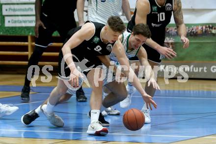 Basketball 2. Liga 2021/2022. Grunddurchgang 19. Runde.  KOS Celovec gegen  RAIDERS Tirol.  Jan Michel  (KOS), Ziga Habat  (Tirol). Klagenfurt, am 12.3.2022.
Foto: Kuess
www.qspictures.net
---
pressefotos, pressefotografie, kuess, qs, qspictures, sport, bild, bilder, bilddatenbank