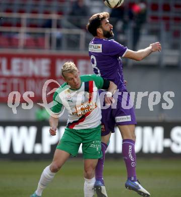 Fussball Bundesliga. Play-off. SK Austria Klagenfurt gegen Rapid Wien.  Kosmas Gkezos, (Klagenfurt),  Marco Gruell  (Rapid). Klagenfurt, am 13.3.2022.
Foto: Kuess
www.qspictures.net
---
pressefotos, pressefotografie, kuess, qs, qspictures, sport, bild, bilder, bilddatenbank