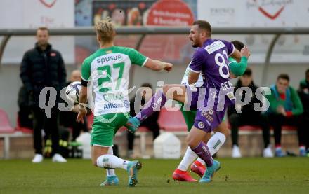 Fussball Bundesliga. Play-off. SK Austria Klagenfurt gegen Rapid Wien.  Turgay Gemicibasi, (Klagenfurt), Marco Gruell   (Rapid). Klagenfurt, am 13.3.2022.
Foto: Kuess
www.qspictures.net
---
pressefotos, pressefotografie, kuess, qs, qspictures, sport, bild, bilder, bilddatenbank