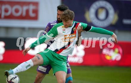 Fussball Bundesliga. Play-off. SK Austria Klagenfurt gegen Rapid Wien.  Kosmas Gkezos,  (Klagenfurt),  Ferdy Druijf (Rapid). Klagenfurt, am 13.3.2022.
Foto: Kuess
www.qspictures.net
---
pressefotos, pressefotografie, kuess, qs, qspictures, sport, bild, bilder, bilddatenbank