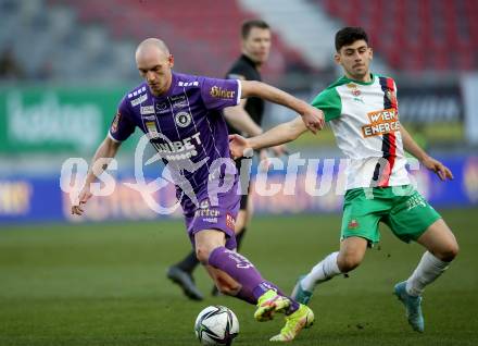 Fussball Bundesliga. Play-off. SK Austria Klagenfurt gegen Rapid Wien.  Nicolas Wimmer,  (Klagenfurt),  Yusuf Demir (Rapid). Klagenfurt, am 13.3.2022.
Foto: Kuess
www.qspictures.net
---
pressefotos, pressefotografie, kuess, qs, qspictures, sport, bild, bilder, bilddatenbank