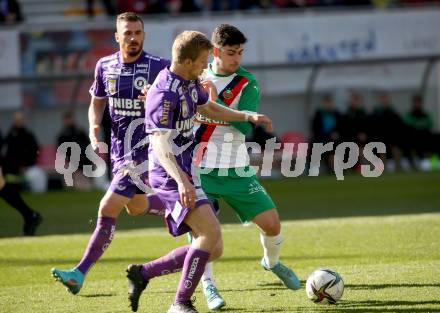 Fussball Bundesliga. Play-off. SK Austria Klagenfurt gegen Rapid Wien.  Christopher Cvetko, Turgay Gemicibasi,  (Klagenfurt), Yusuf Demir  (Rapid). Klagenfurt, am 13.3.2022.
Foto: Kuess
www.qspictures.net
---
pressefotos, pressefotografie, kuess, qs, qspictures, sport, bild, bilder, bilddatenbank