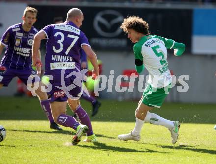 Fussball Bundesliga. Play-off. SK Austria Klagenfurt gegen Rapid Wien.  Nicolas Wimmer,  (Klagenfurt),  Robert Ljubicic (Rapid). Klagenfurt, am 13.3.2022.
Foto: Kuess
www.qspictures.net
---
pressefotos, pressefotografie, kuess, qs, qspictures, sport, bild, bilder, bilddatenbank