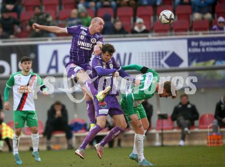 Fussball Bundesliga. Play-off. SK Austria Klagenfurt gegen Rapid Wien.  Nicolas Wimmer, Ivan Saravanja, (Klagenfurt),  Ferdy Druijf  (Rapid). Klagenfurt, am 13.3.2022.
Foto: Kuess
www.qspictures.net
---
pressefotos, pressefotografie, kuess, qs, qspictures, sport, bild, bilder, bilddatenbank