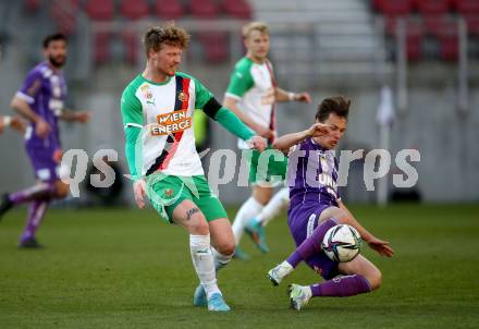 Fussball Bundesliga. Play-off. SK Austria Klagenfurt gegen Rapid Wien.  Alex Timossi Andersson, (Klagenfurt), Ferdy Druijf   (Rapid). Klagenfurt, am 13.3.2022.
Foto: Kuess
www.qspictures.net
---
pressefotos, pressefotografie, kuess, qs, qspictures, sport, bild, bilder, bilddatenbank