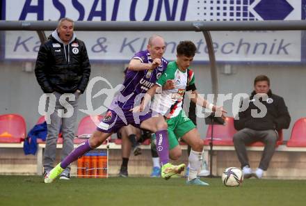 Fussball Bundesliga. Play-off. SK Austria Klagenfurt gegen Rapid Wien.  Nicolas Wimmer,  (Klagenfurt), Bernhard Zimmermann  (Rapid). Klagenfurt, am 13.3.2022.
Foto: Kuess
www.qspictures.net
---
pressefotos, pressefotografie, kuess, qs, qspictures, sport, bild, bilder, bilddatenbank