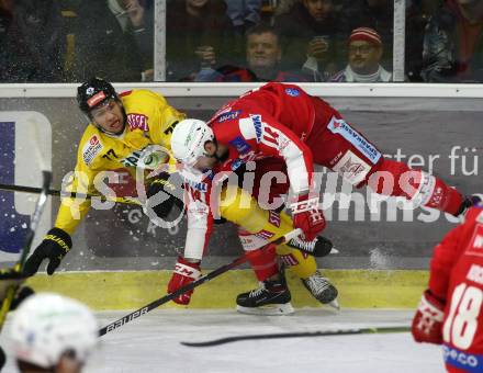 EBEL. Eishockey Bundesliga. KAC gegen	spusu Vienna Capitals. Paul Postma,  (KAC), Matt Bradley  (Vienna Capitals). Klagenfurt, am 13.3.2022.
Foto: Kuess
www.qspictures.net

---
pressefotos, pressefotografie, kuess, qs, qspictures, sport, bild, bilder, bilddatenbank