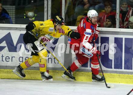 EBEL. Eishockey Bundesliga. KAC gegen	spusu Vienna Capitals. Nicholas Eric Petersen, (KAC),  Dominic Hackl  (Vienna Capitals). Klagenfurt, am 13.3.2022.
Foto: Kuess
www.qspictures.net

---
pressefotos, pressefotografie, kuess, qs, qspictures, sport, bild, bilder, bilddatenbank