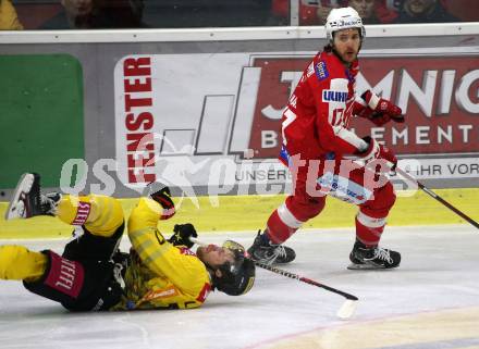 EBEL. Eishockey Bundesliga. KAC gegen	spusu Vienna Capitals. Manuel Ganahl, (KAC),  Joel Lowry  (Vienna Capitals). Klagenfurt, am 13.3.2022.
Foto: Kuess
www.qspictures.net

---
pressefotos, pressefotografie, kuess, qs, qspictures, sport, bild, bilder, bilddatenbank