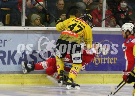 EBEL. Eishockey Bundesliga. KAC gegen	spusu Vienna Capitals. Matthew Fraser,   (KAC), Anton Karlsson  (Vienna Capitals). Klagenfurt, am 13.3.2022.
Foto: Kuess
www.qspictures.net

---
pressefotos, pressefotografie, kuess, qs, qspictures, sport, bild, bilder, bilddatenbank