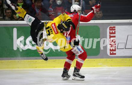 EBEL. Eishockey Bundesliga. KAC gegen	spusu Vienna Capitals. Manuel Ganahl, (KAC),  Joel Lowry  (Vienna Capitals). Klagenfurt, am 13.3.2022.
Foto: Kuess
www.qspictures.net

---
pressefotos, pressefotografie, kuess, qs, qspictures, sport, bild, bilder, bilddatenbank