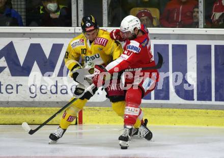 EBEL. Eishockey Bundesliga. KAC gegen	spusu Vienna Capitals. Martin Schumnig,  (KAC), Patrick Antal  (Vienna Capitals). Klagenfurt, am 13.3.2022.
Foto: Kuess
www.qspictures.net

---
pressefotos, pressefotografie, kuess, qs, qspictures, sport, bild, bilder, bilddatenbank