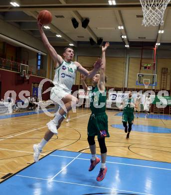 Basketball 2. Liga 2021/2022. Grunddurchgang 13. Runde.  KOS Celovec gegen  Dornbirn Lions. Marko Gutalj  (KOS),  Felix Erath (Dornbirn). Klagenfurt, am 19.3.2022.
Foto: Kuess
www.qspictures.net
---
pressefotos, pressefotografie, kuess, qs, qspictures, sport, bild, bilder, bilddatenbank