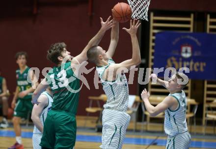 Basketball 2. Liga 2021/2022. Grunddurchgang 13. Runde.  KOS Celovec gegen  Dornbirn Lions.  Erik Groznik (KOS), Hampus Ramstedt   (Dornbirn). Klagenfurt, am 19.3.2022.
Foto: Kuess
www.qspictures.net
---
pressefotos, pressefotografie, kuess, qs, qspictures, sport, bild, bilder, bilddatenbank