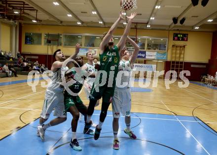 Basketball 2. Liga 2021/2022. Grunddurchgang 13. Runde.  KOS Celovec gegen  Dornbirn Lions.  Marin Sliskovic, Erik Groznik (KOS),  Hampus Ramstedt, Thimothee Troussel  (Dornbirn). Klagenfurt, am 19.3.2022.
Foto: Kuess
www.qspictures.net
---
pressefotos, pressefotografie, kuess, qs, qspictures, sport, bild, bilder, bilddatenbank