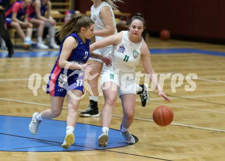 Basketball Damen Superliga 2021/2022. Grunddurchgang 11. Runde.  KOS Celovec Damen gegen   UBSC-DBBC Graz. Elma Voljevica  (KOS), Paula Hochstrasser   (Graz). Klagenfurt, am 19.3.2022.
Foto: Kuess
www.qspictures.net
---
pressefotos, pressefotografie, kuess, qs, qspictures, sport, bild, bilder, bilddatenbank