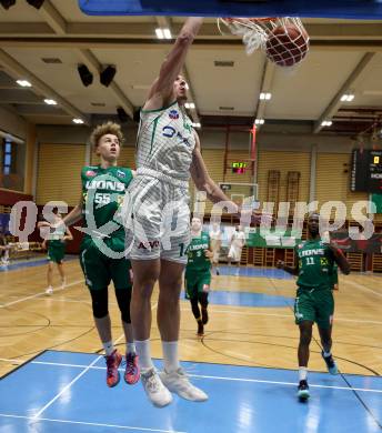 Basketball 2. Liga 2021/2022. Grunddurchgang 13. Runde.  KOS Celovec gegen  Dornbirn Lions. Marko Gutalj  (KOS),  Felix Erath (Dornbirn). Klagenfurt, am 19.3.2022.
Foto: Kuess
www.qspictures.net
---
pressefotos, pressefotografie, kuess, qs, qspictures, sport, bild, bilder, bilddatenbank