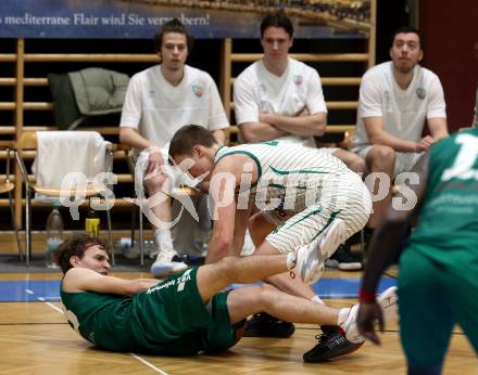 Basketball 2. Liga 2021/2022. Grunddurchgang 13. Runde.  KOS Celovec gegen  Dornbirn Lions. Samuel Seher  (KOS),  Paul Pitscheider  (Dornbirn). Klagenfurt, am 19.3.2022.
Foto: Kuess
www.qspictures.net
---
pressefotos, pressefotografie, kuess, qs, qspictures, sport, bild, bilder, bilddatenbank