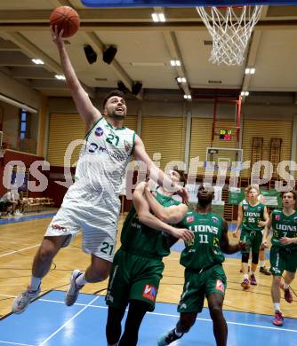 Basketball 2. Liga 2021/2022. Grunddurchgang 13. Runde.  KOS Celovec gegen  Dornbirn Lions.  Marin Sliskovic (KOS), Panagiotis Zaraidonis   (Dornbirn). Klagenfurt, am 19.3.2022.
Foto: Kuess
www.qspictures.net
---
pressefotos, pressefotografie, kuess, qs, qspictures, sport, bild, bilder, bilddatenbank