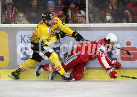 EBEL. Eishockey Bundesliga. KAC gegen	spusu Vienna Capitals. Thomas Hundertpfund,  (KAC),  James Sheppard (Vienna Capitals). Klagenfurt, am 20.3.2022.
Foto: Kuess
www.qspictures.net

---
pressefotos, pressefotografie, kuess, qs, qspictures, sport, bild, bilder, bilddatenbank