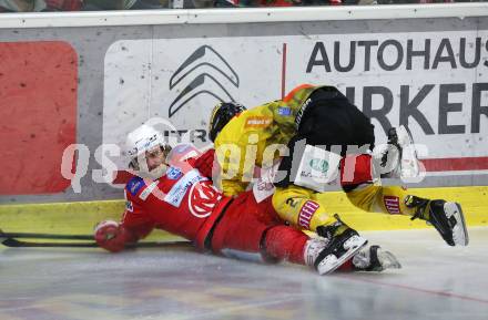 EBEL. Eishockey Bundesliga. KAC gegen	spusu Vienna Capitals. Samuel Witting,  (KAC),  Lukas Piff (Vienna Capitals). Klagenfurt, am 20.3.2022.
Foto: Kuess
www.qspictures.net

---
pressefotos, pressefotografie, kuess, qs, qspictures, sport, bild, bilder, bilddatenbank