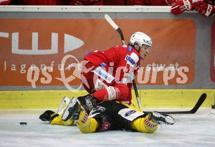 EBEL. Eishockey Bundesliga. KAC gegen	spusu Vienna Capitals. Nikolaus Kraus, (KAC), Christof Kromp   (Vienna Capitals). Klagenfurt, am 20.3.2022.
Foto: Kuess
www.qspictures.net

---
pressefotos, pressefotografie, kuess, qs, qspictures, sport, bild, bilder, bilddatenbank