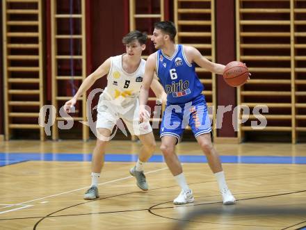 Basketball Zweite Liga 2021/2022. Grunddurchgang 16. Runde.  Woerthersee Piraten gegen Kufstein Towers. Felix Leindecker  (Piraten),  Luka Bozak  (Kufstein). Klagenfurt, am 20.3.2022. 
Foto: Kuess
www.qspictures.net

---
pressefotos, pressefotografie, kuess, qs, qspictures, sport, bild, bilder, bilddatenbank