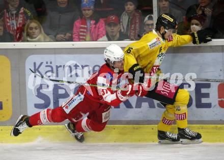 EBEL. Eishockey Bundesliga. KAC gegen	spusu Vienna Capitals. Fabian Hochegger,  (KAC),  Simeon Schwinger (Vienna Capitals). Klagenfurt, am 20.3.2022.
Foto: Kuess
www.qspictures.net

---
pressefotos, pressefotografie, kuess, qs, qspictures, sport, bild, bilder, bilddatenbank