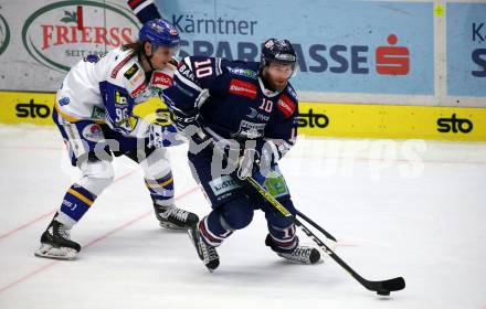 EBEL. Eishockey Bundesliga. VSV gegen Hydro Fehervar AV 19.  Anton Karlsson, (VSV), Istvan Bartalis   (Hydro Fehervar). Villach, am 24.3.2022.
Foto: Kuess
www.qspictures.net
---
pressefotos, pressefotografie, kuess, qs, qspictures, sport, bild, bilder, bilddatenbank