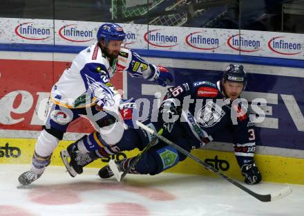 EBEL. Eishockey Bundesliga. VSV gegen Hydro Fehervar AV 19.  Nico Brunner, (VSV),  Csanad Erdely  (Hydro Fehervar). Villach, am 24.3.2022.
Foto: Kuess
www.qspictures.net
---
pressefotos, pressefotografie, kuess, qs, qspictures, sport, bild, bilder, bilddatenbank