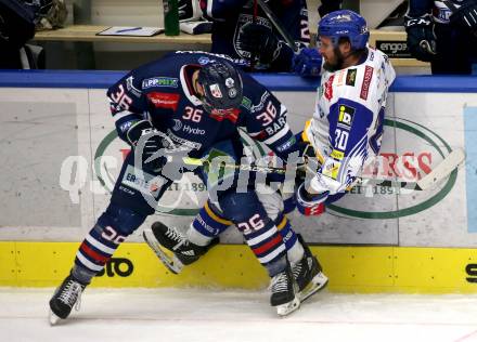 EBEL. Eishockey Bundesliga. VSV gegen Hydro Fehervar AV 19. Nico Brunner, (VSV),  Csanad Erdely   (Hydro Fehervar). Villach, am 1.4.2022.
Foto: Kuess
www.qspictures.net
---
pressefotos, pressefotografie, kuess, qs, qspictures, sport, bild, bilder, bilddatenbank