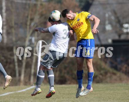 Fussball 2. Klasse B. SG KSK-Woerthersee/ATUS Poertschach gegen Afritz.  Marcel Kaiser (KSK-Woerthersee/Poertschach), Fabian Orter   (Afritz). Krumpendorf, 26.3.2022.
Foto: Kuess

---
pressefotos, pressefotografie, kuess, qs, qspictures, sport, bild, bilder, bilddatenbank