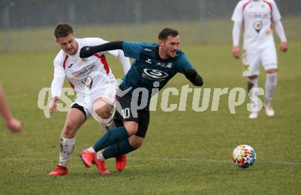 Fussball Kaerntner Liga. Kraig gegen Gmuend. Mario Antunovic (Kraig),   Marcel Rudolf Schoenherr (Gmuend). Kraig, am 2.4.2022.
Foto: Kuess
---
pressefotos, pressefotografie, kuess, qs, qspictures, sport, bild, bilder, bilddatenbank