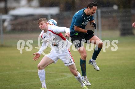 Fussball Kaerntner Liga. Kraig gegen Gmuend. Sebastian Hertelt  (Kraig),  Domenik Steiner (Gmuend). Kraig, am 2.4.2022.
Foto: Kuess
---
pressefotos, pressefotografie, kuess, qs, qspictures, sport, bild, bilder, bilddatenbank