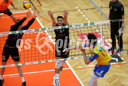 Volleyball. Austrian Volley League Men. SK Zadruga Aich/Dob gegen VCA Amstetten NOE.  Xander Ketrzynski,  (Aich), Jordan Deshane, Jakub Czyzowski  (Amstetten). Bleiburg, 2.4.2022.
Foto: Kuess
www.qspictures.net
---
pressefotos, pressefotografie, kuess, qs, qspictures, sport, bild, bilder, bilddatenbank