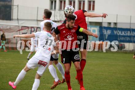 Fussball Karntner Liga. St. Jakob gegen Maria Saal.  Manuel Alexander Schuettelkopf  (St. Jakob), Jon Benkovic  (Maria Saal). St. Jakob im Rosental, am 8.4.2022.
Foto: Kuess
---
pressefotos, pressefotografie, kuess, qs, qspictures, sport, bild, bilder, bilddatenbank