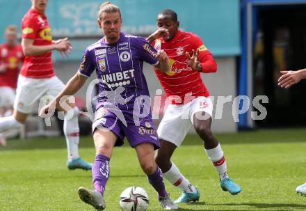 Fussball Bundesliga. SK Austria Klagenfurt gegen Red Bull Salzburg.   Patrick Greil, (Klagenfurt), Mohamed Camara   (Salzburg). Klagenfurt, am 10.4.2022.
Foto: Kuess
---
pressefotos, pressefotografie, kuess, qs, qspictures, sport, bild, bilder, bilddatenbank