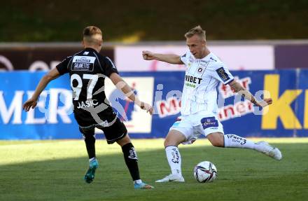 Fussball Bundesliga. Meistergruppe. WAC gegen Austria Klagenfurt. Adis Jasic,  (WAC),  Florian Jaritz (Klagenfurt). Wolfsberg, am 17.4.2022.
Foto: Kuess
www.qspictures.net
---
pressefotos, pressefotografie, kuess, qs, qspictures, sport, bild, bilder, bilddatenbank