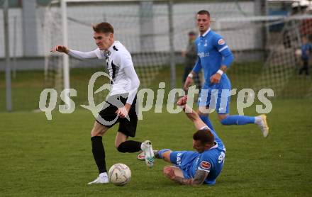 Fussball Kaerntner Liga. Bleiburg gegen SAK.  Mathias Robert Knauder (Bleiburg),  Marko Gajic  (SAK). Bleiburg, 16.4.2022.
Foto: Kuess
---
pressefotos, pressefotografie, kuess, qs, qspictures, sport, bild, bilder, bilddatenbank