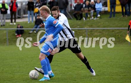 Fussball Kaerntner Liga. Bleiburg gegen SAK.  Adnan Besic (Bleiburg),    Toni Dullnig (SAK). Bleiburg, 16.4.2022.
Foto: Kuess
---
pressefotos, pressefotografie, kuess, qs, qspictures, sport, bild, bilder, bilddatenbank