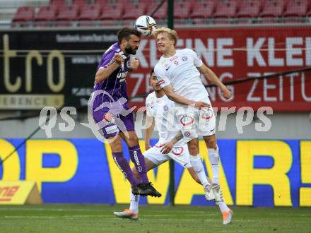 Fussball Bundesliga. Play-off. SK Austria Klagenfurt gegen FK Austria Wien.  Kosmas Gkezos, (Klagenfurt),  Matthias Braunoeder  (Wien). Klagenfurt, am 15.5.2022.
Foto: Kuess
www.qspictures.net
---
pressefotos, pressefotografie, kuess, qs, qspictures, sport, bild, bilder, bilddatenbank