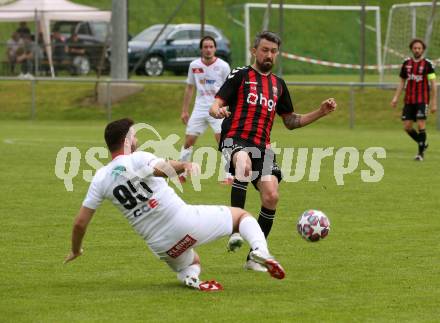 Fussball. Kaerntner Liga. Admira Villach gegen Maria Saal.  Dejan Kecanovic (Admira Villach), Matic Zupanc (Maria Saal). Villach, 14.5.2022.
Foto: Kuess
---
pressefotos, pressefotografie, kuess, qs, qspictures, sport, bild, bilder, bilddatenbank