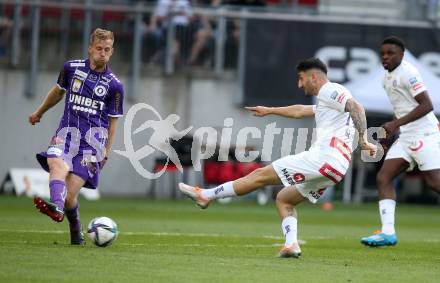 Fussball Bundesliga. Play-off. SK Austria Klagenfurt gegen FK Austria Wien.  Christopher Cvetko, (Klagenfurt), Can Keles   (Wien). Klagenfurt, am 15.5.2022.
Foto: Kuess
www.qspictures.net
---
pressefotos, pressefotografie, kuess, qs, qspictures, sport, bild, bilder, bilddatenbank